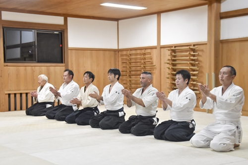 Aikido practitioners training at the dojo